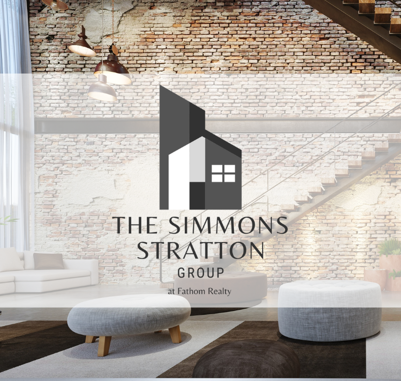 The Simmons Stratton Group Logo Overlayed in a Living Room